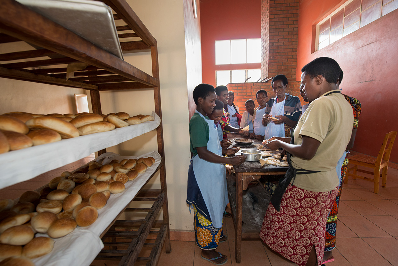 Women learn how to bake bread, chapatis, and samosas to sell in the local market