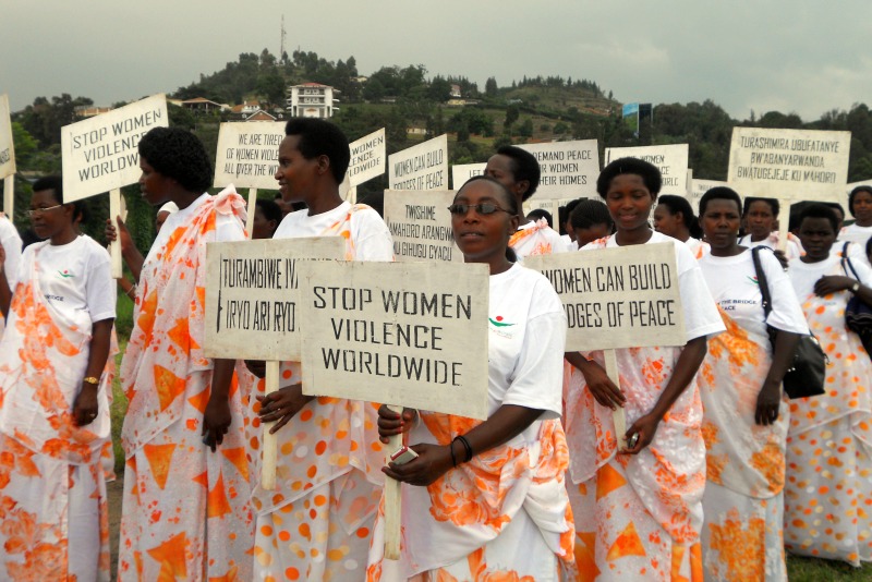 Women march for an end to violence in the DRC