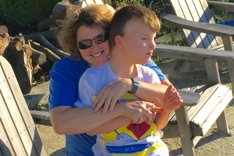 A recent photo of Women for Women International CEO, Jennifer L. Windsor at the beach with her 10-year-old son Jackson.