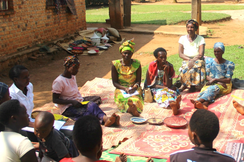 Program graduates in Rwanda come together to form a Village Savings and Loan Association