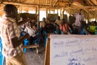 A discussion about the shared responsibilities between husband and wife in a Men's Engagement class. Photo credit: Charles Atiki Lomodong