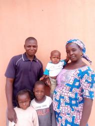 Saratu, a participant in Nigeria, and her family