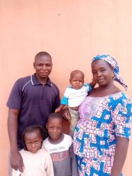 Saratu, a participant in Nigeria, and her family