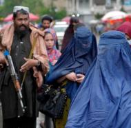 Taliban order Afghan women to wear burqas in public.