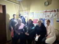 Women waiting in line to receive support at the clinic, with electricity cut off at times. 