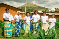 Program graduates in the DRC pose with their certificates. 