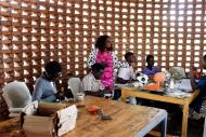 Emerance teaching women at the WOC. Credit Assoumani Sibomana
