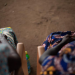 DRC women sitting