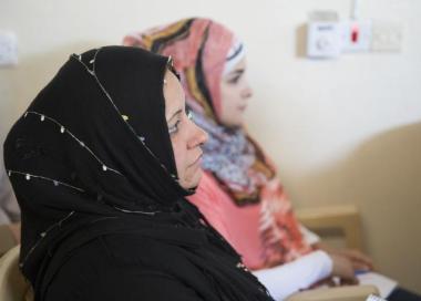 two women listening in class