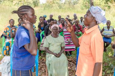  Women roleplaying in conflict resolution training in Randukwe, Yei, South Sudan. Photo credit: Charles Atiki Lomodong