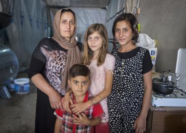 Seve, a graduate from Iraq, with her daughters and son 
