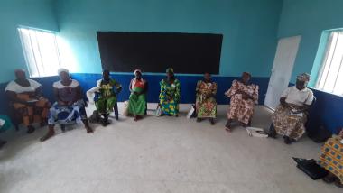 Saratu and her group practice social distancing during a COVID-19 awareness session