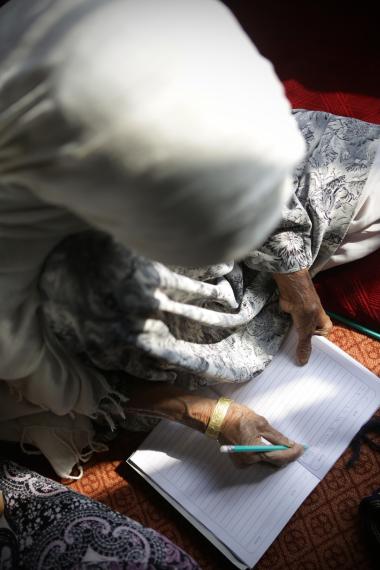 woman writing top view