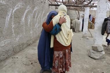 afghan women hugging at reopening