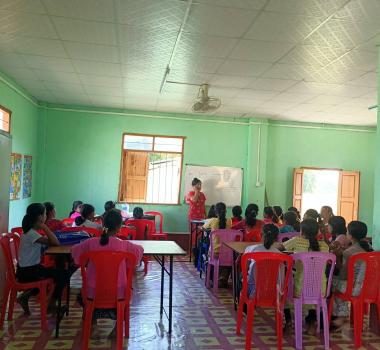 Rohingya girls in Myanmar gather to learn life skills from local teachers.
