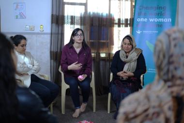 Khalida with women at the WfWI KRI Center