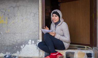Iraq participant writing - Photo credit: Emily Kinskey