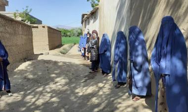 Photograph of women receiving hygiene kits in Afghanistan