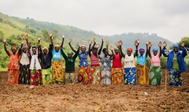 Rwanda participant celebrate in a row