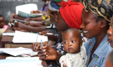 A WfW-Rwanda participant with her child
