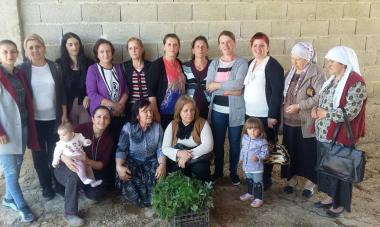 group of women survivors of war and children