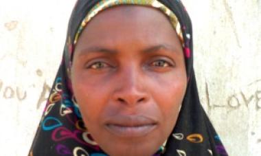 up close picture of woman in headscarf 