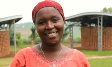 woman in pink shirt smiling