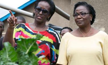 two women pictured one in colorful shirt and one in yellow shirt