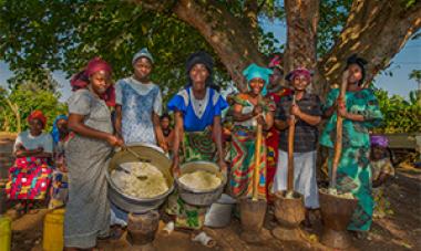 women holding cooking tools