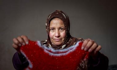 Iraq woman with woven dress
