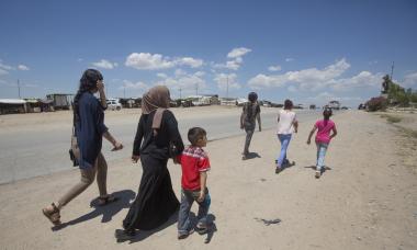 Displaced Yezidi woman, Seve, and her family. Photo credit: Alison Baskerville