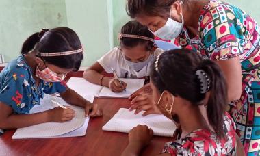 Adolescent Rohingya girls attending class in Rakhine State, Myanmar