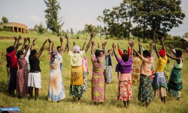 rwanda group hands up