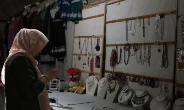 Ferhana working at her shop. 