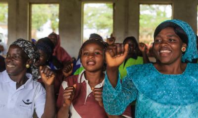 women graduates celebrating 