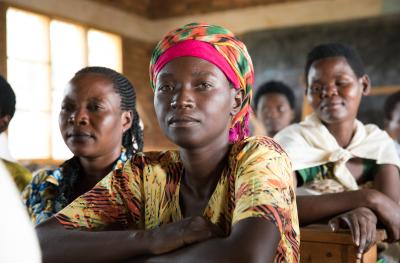 Rwanda - woman in classroom looking at camera